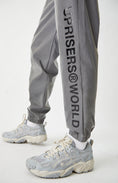 Load image into Gallery viewer, UPRISERS.WORLD REFLECTIVE JOGGER PANTS
