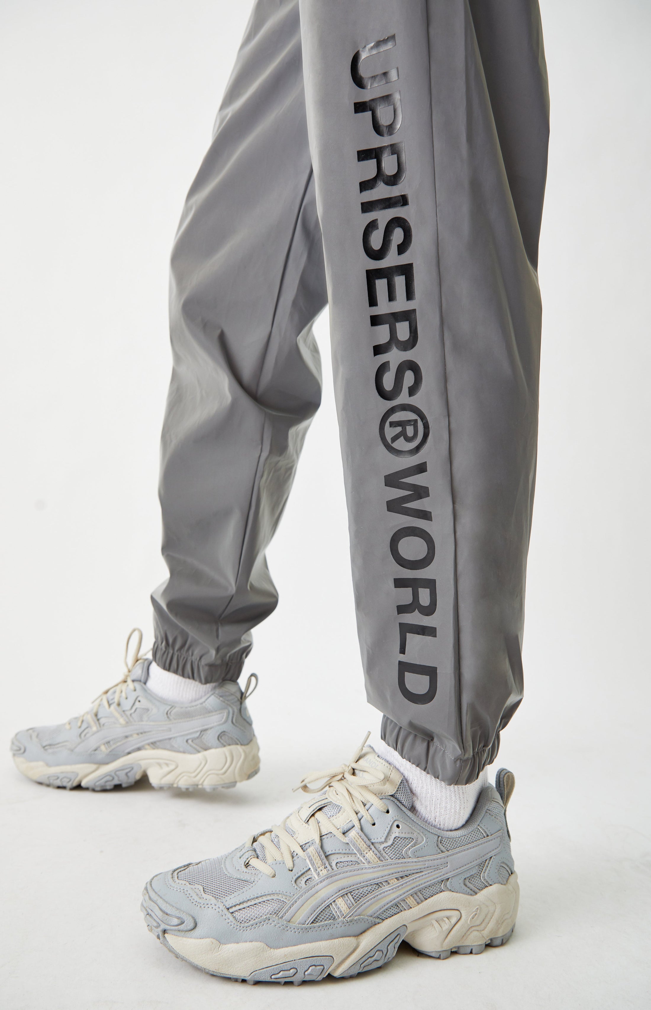 UPRISERS.WORLD REFLECTIVE JOGGER PANTS