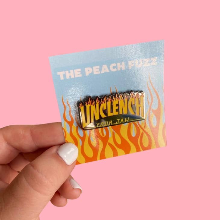 Peach Fuzz "Unclench Your Jaw" Enamel Pin