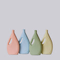 Load image into Gallery viewer, Middle Kingdom Matte Porcelain Laundry Detergent Bottle Vase (Dusty Pink)
